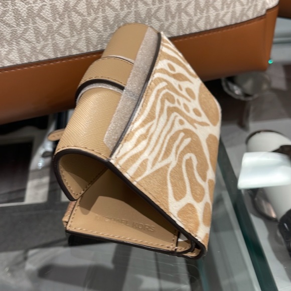 MICHAEL KORS
Carmen Medium Flap Bifold Faux Fur-Leather Wallet
Camel 
NWT - Picture 9 of 16